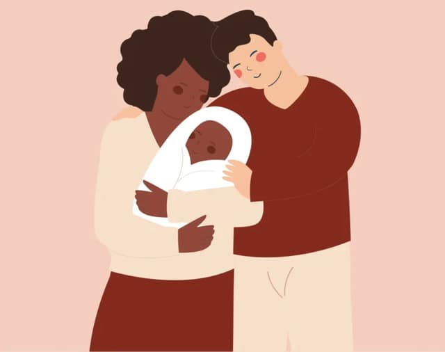 ein Mann und eine Frau mit einem Baby in Co-Elternschaft
